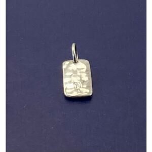 Waxing Poetic sterling silver Tag Insignia charm